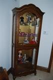 China cabinet with collectible dolls