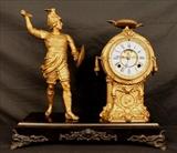 5 - Cast iron figural clock, 19 in. T, 19 in. W, 7 in. D.