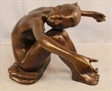 75 - Bronze nude life size girl, 23 in. T, 32  in. W, 23 in. D.