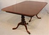81 - Contemporary Ethan Allen solid cherry dining table with 2 leaves, 29 in. T, 66.5 in. L, 42 in. W, leaves are 18 in.