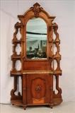 85 - Walnut etagere with marble insert, nuts carved on door, 85 in. T, 45 in. W, 14 in. D.