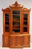 88 - Walnut Victorian breakfront in excellent condition with original crest and burl walnut trim, 8 ft. T, 62 in. W, 21 in. D.