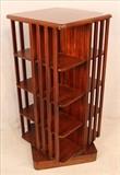90 - Turning bookcase with inlaid top, 42 in. T, 20 in. Sq.