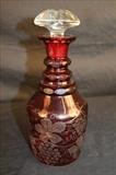 107 - Cranberry wine decanter with stopper, 10 in. T.