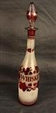 106 - Cranberry cut to clear whiskey decanter with stopper, 15 in. T.