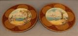 149 - Pair of crown porcelain cabinet plates with painted scenes and heavy gold. 11 in. D.