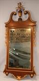 159 - mirror  with gold decoration and broken arch top, 54 in. T, 23 in. W.