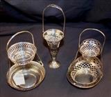 174 - Two sterling nut dishes, 7 in. T, 4 in. D.