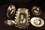 308 - Five pieces sterling silver trays.