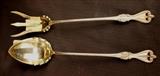 273 - Two sterling serving pieces.
