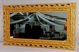 285 - Retangular mirror in ornate gold frame, 52x30.