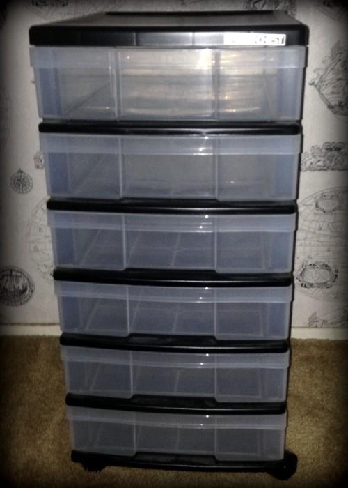 Useful set of portable plastic drawers with rollers!