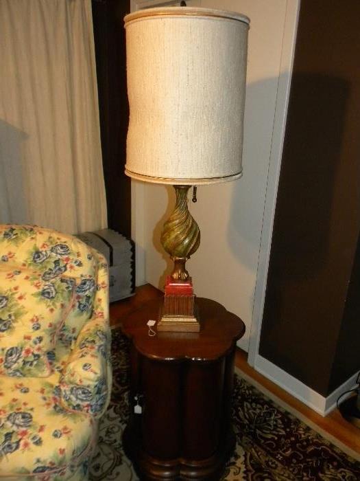 One of pair of mid century lamps and clover shaped lamp table