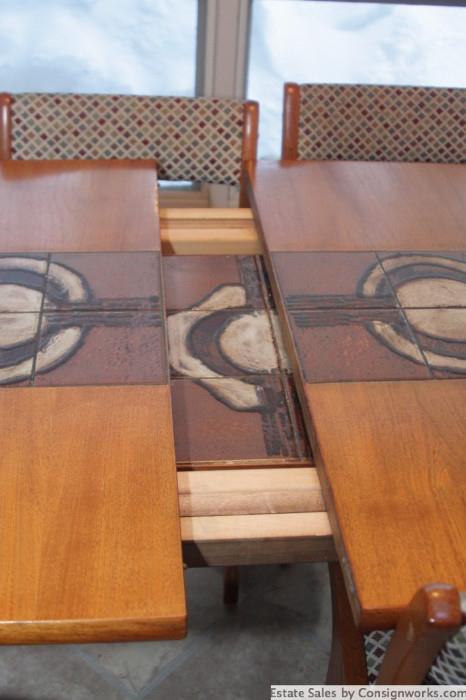 Mid Century Modern table with ceramic tile inlay. Table self-stores 2 leaves