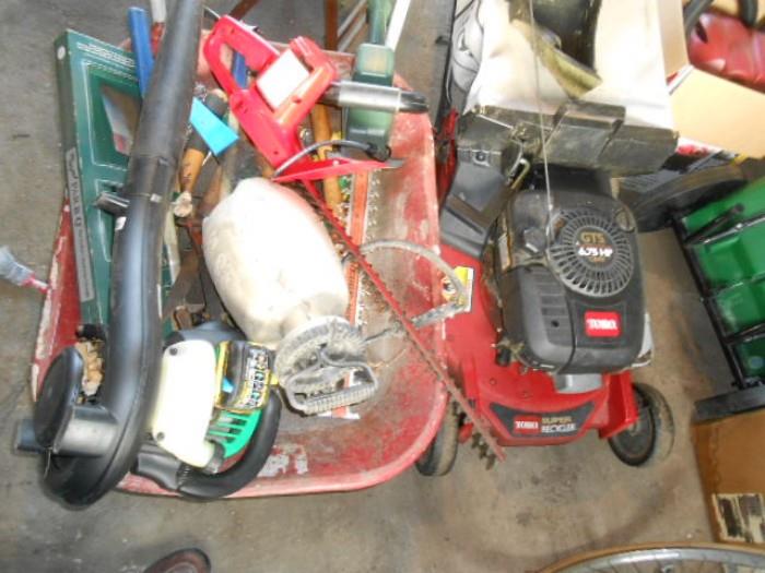 Newer Toro 6.75 mower it runs, wheelbarrow, hedge trimmers, blower and other yard and garden tools