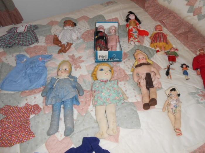 antique Rag Dolls with hand painted or embroidered faces, and other vintage dolls and clothes
