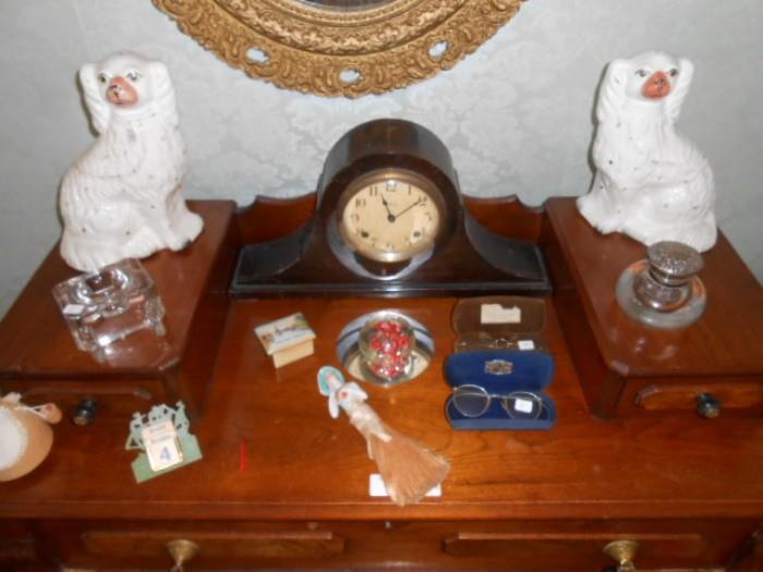 vintage ink wells, eyeglasses, ansonia clock, Staffordshire dogs
