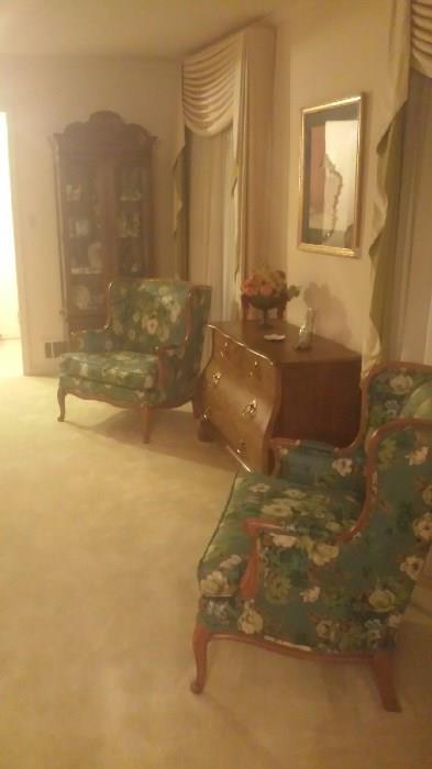 Fantastic lighted curio w/glass shelves.  Matching pair of French Provencal chairs.  All custom window treatments are for sale!