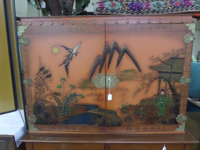 Asian Coromandel lacquered cabinet