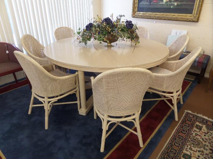 78" round McGuire table and 8 cane back chairs