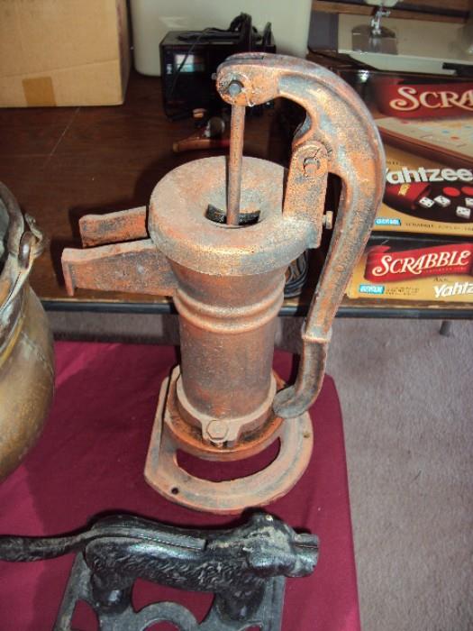antique water pump to draw water from a well 