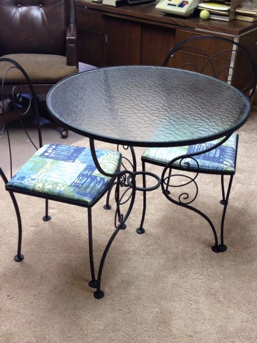 Wrought iron and glass cafe' table and side chairs (2)