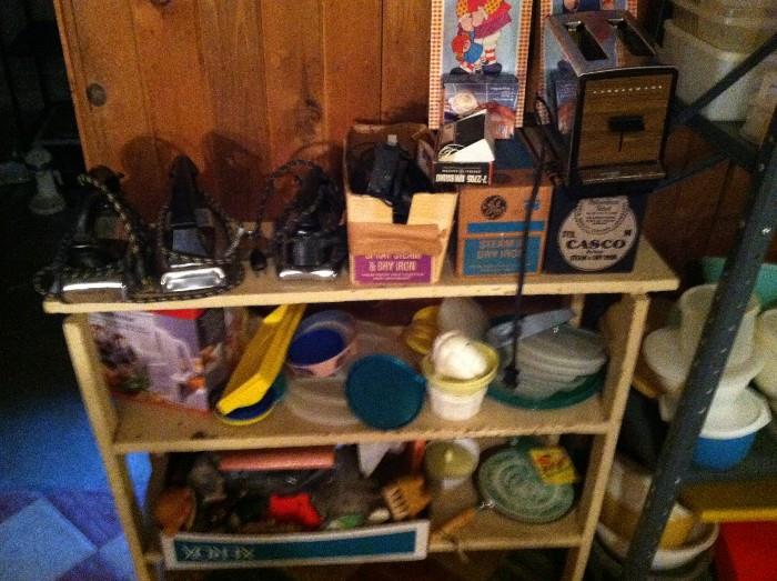 Vintage irons, coffee pots, tupperware.