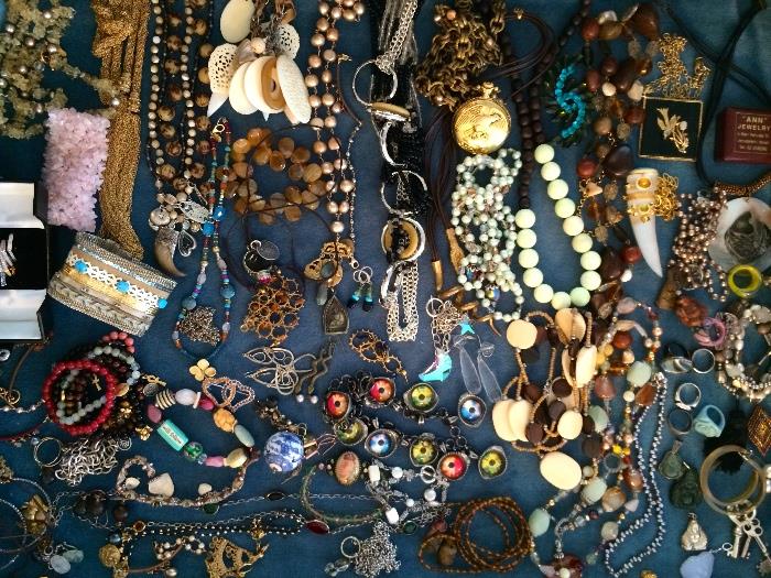 Loaded costume jewelry case, many signed pieces
