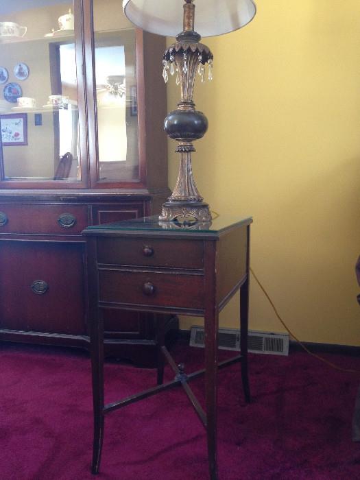 Antique end table (pair available at sale) and decorative lamp