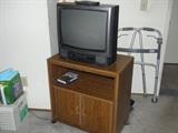 cheap 20 inch TV with remote (works great)  and rolling TV cabinet