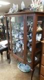 Walnut China cabinet with Fitz and Floyd collection