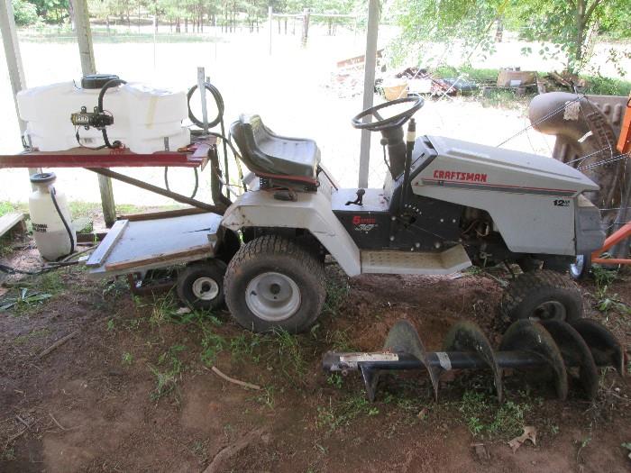 Craftsman lawn tractor equipped with sprayer