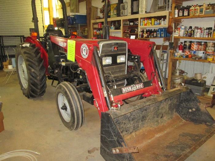 Massey-Ferguson 231C tractor with Bush Hog 2346QT  loader attachment