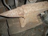 OLD anvil mounted on even older wooden stand