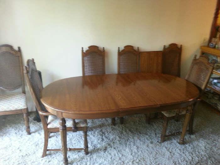 Dining Table with 2 leaves, 2 Armchairs, 4 Sidechairs