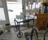 TV trays in a roller cart that opens up to a serving table.