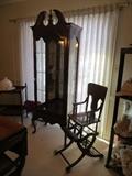 Beautiful curio cabinet and antique high chair