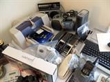 HP printer, RCA boom box, Panasonic electric typewriter, several phones