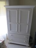 Beautiful Armoire with drawers. Goes with trundle bed