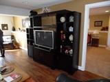Large view of entertainment center TV and decorating pieces not included
