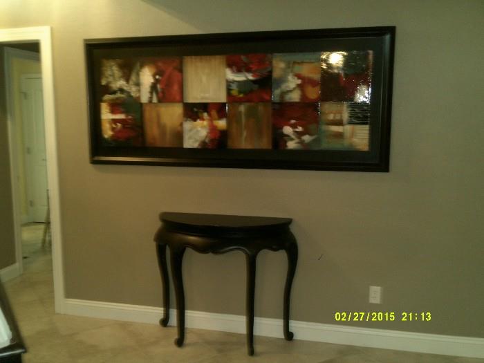 beautiful, large wall art and small table