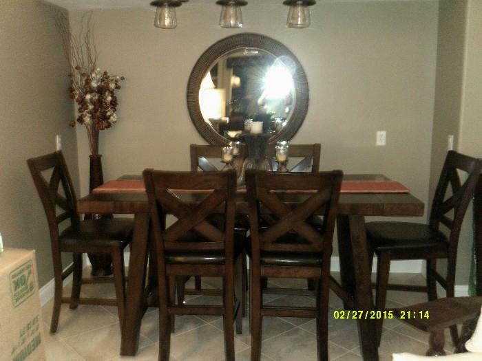 gorgeous, like new, dining table with leaf and 6 chairs