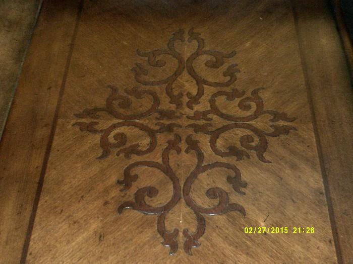 inlay on each side of desk