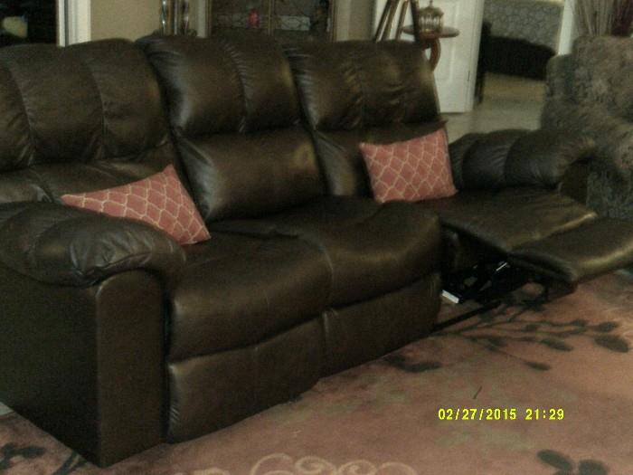 leather sofa with recliner on each end