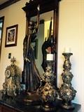 3.5 foot bronze statue of a woman and antique brass clock