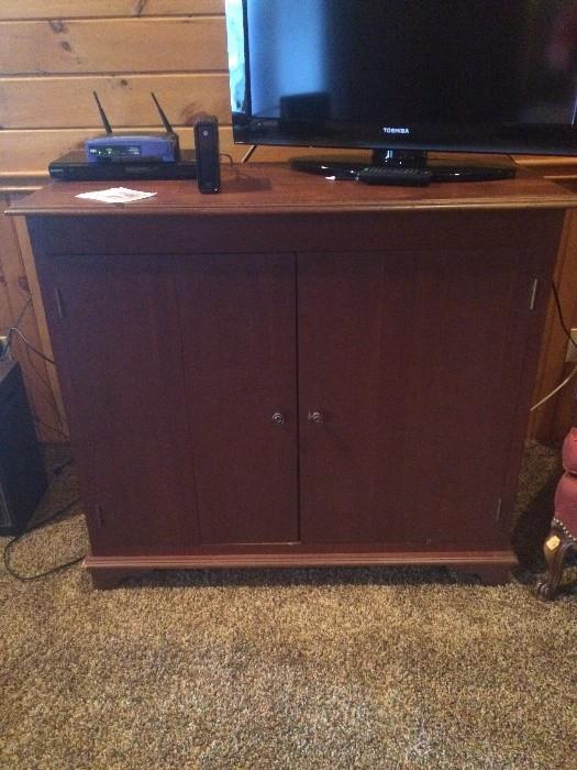 Custom cherry entertainment cabinet with lift lid