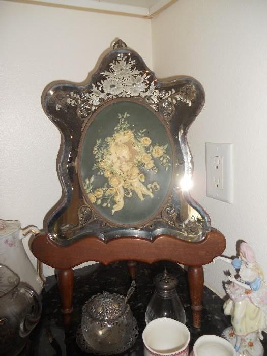 Antique Vanity Mirror that opens to a 3 way mirror