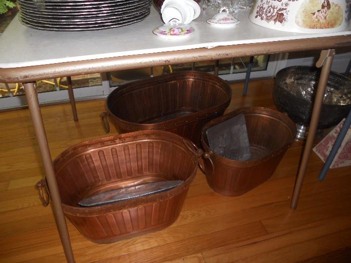 3 solid copper baskets