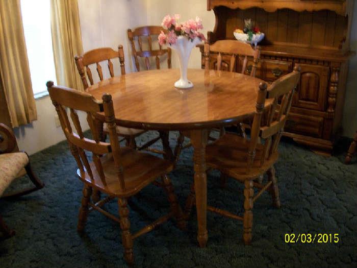 Dining table with 5 of 6 chairs showing