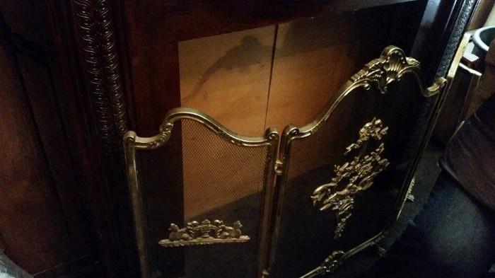 Ornate Brass fireplace screen. 